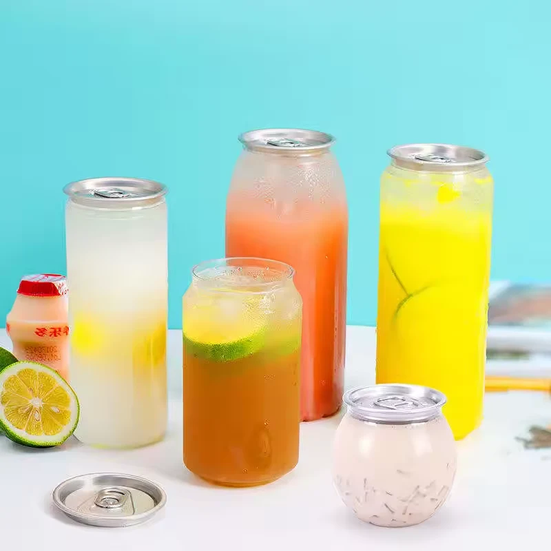Clear PET juice cans with custom labels and aluminum easy-open lids in multiple sizes